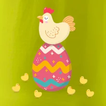 Sliepka sediaca na veľkonočnom vajci