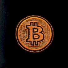 Logo bitcoin vo vyšívanom štýle