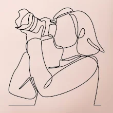 Fotografka stojaca jedným ťahom