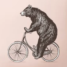 Medveď na bicykli