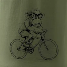 Opice s okuliarmi na bicykli