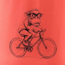 Opice s okuliarmi na bicykli