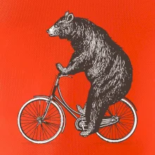 Medveď na bicykli