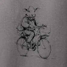 Krava v obleku na bicykli
