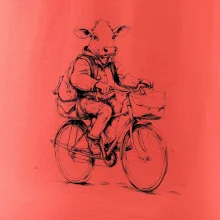 Krava v obleku na bicykli