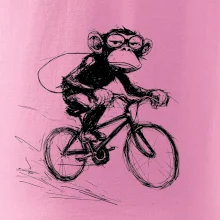 Opice s batohom na bicykli