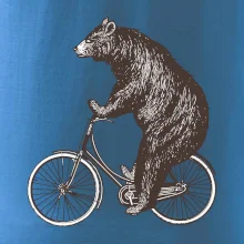 Medveď na bicykli