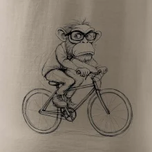 Opice s okuliarmi na bicykli