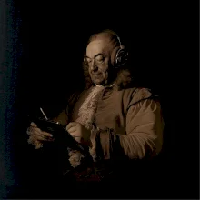 Johann Sebastian Bach so slúchadlami Johann Sebastian Bach so slúchadlami