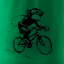 Opice s batohom na bicykli