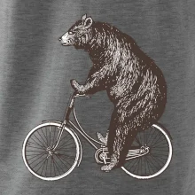 Medveď na bicykli