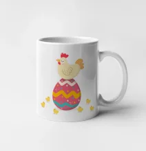 Sliepka sediaca na veľkonočnom vajci