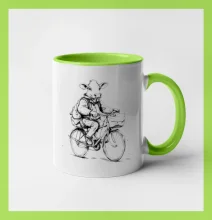 Krava v obleku na bicykli