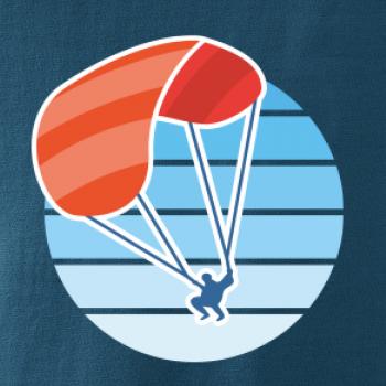 Paragliding oranžový v modrom koliesku