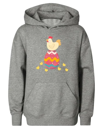 Sliepka sediaca na veľkonočnom vajci