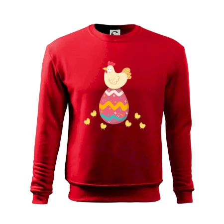 Sliepka sediaca na veľkonočnom vajci