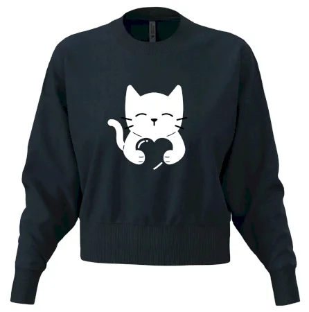 Mačka drží srdce