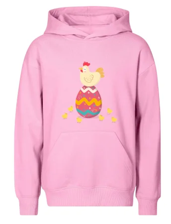 Sliepka sediaca na veľkonočnom vajci