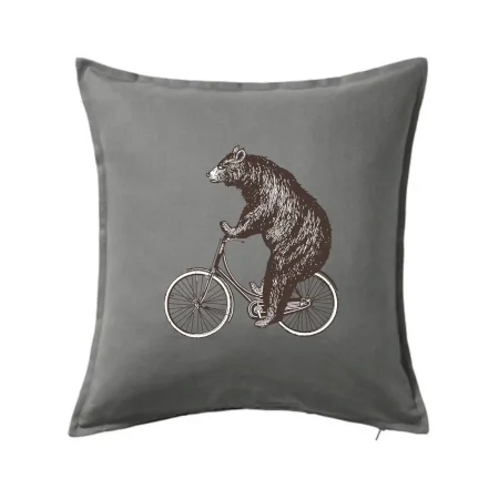Medveď na bicykli