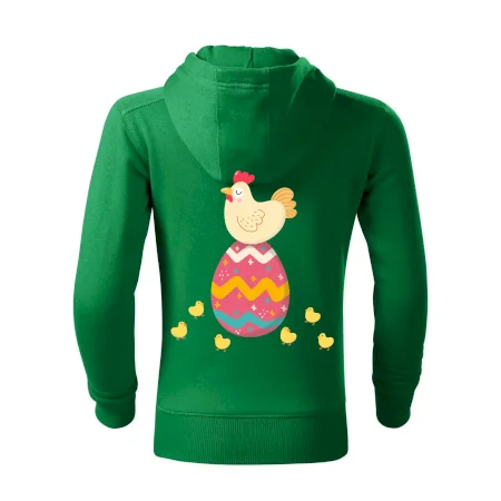 Sliepka sediaca na veľkonočnom vajci