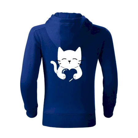 Mačka drží srdce