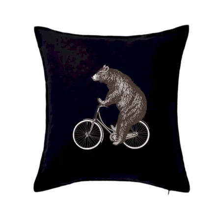Medveď na bicykli