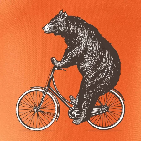 Medveď na bicykli