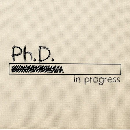 In progress titul Ph.D. doktor / doktorka (filozofia)