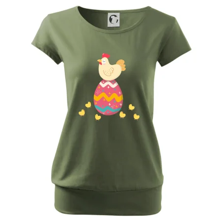 Sliepka sediaca na veľkonočnom vajci