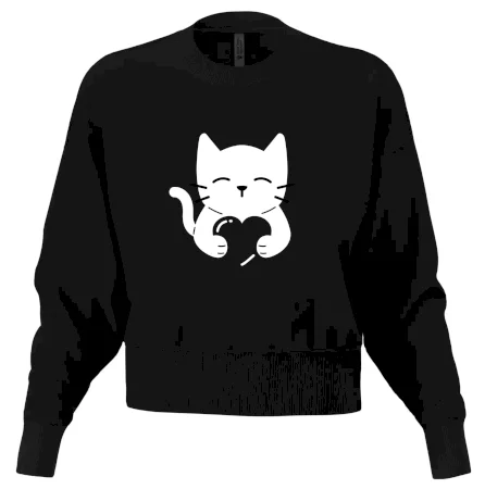 Mačka drží srdce