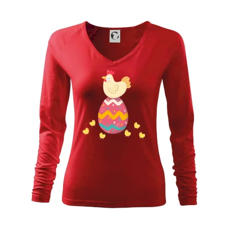 Sliepka sediaca na veľkonočnom vajci