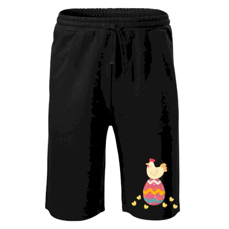 Sliepka sediaca na veľkonočnom vajci