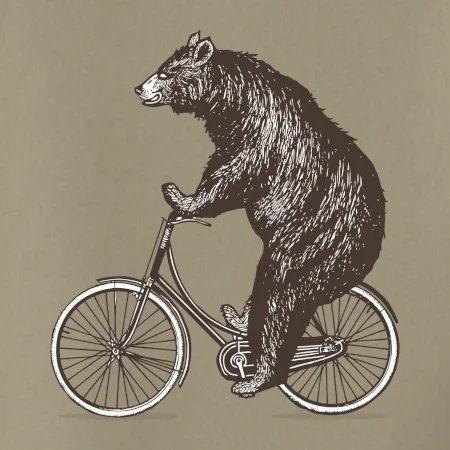Medveď na bicykli