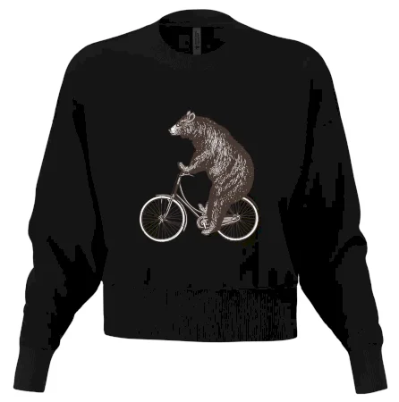 Medveď na bicykli