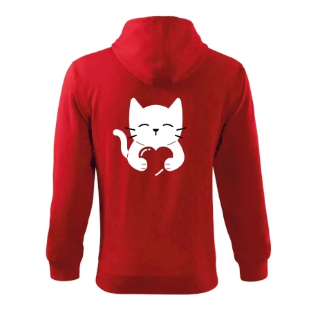 Mačka drží srdce