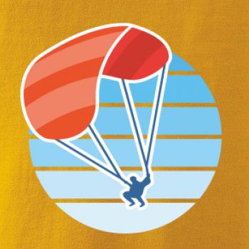 Paragliding oranžový v modrom koliesku