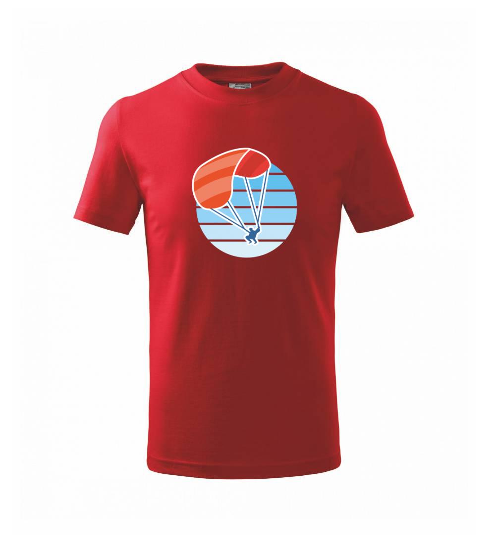 Paragliding oranžový v modrom koliesku