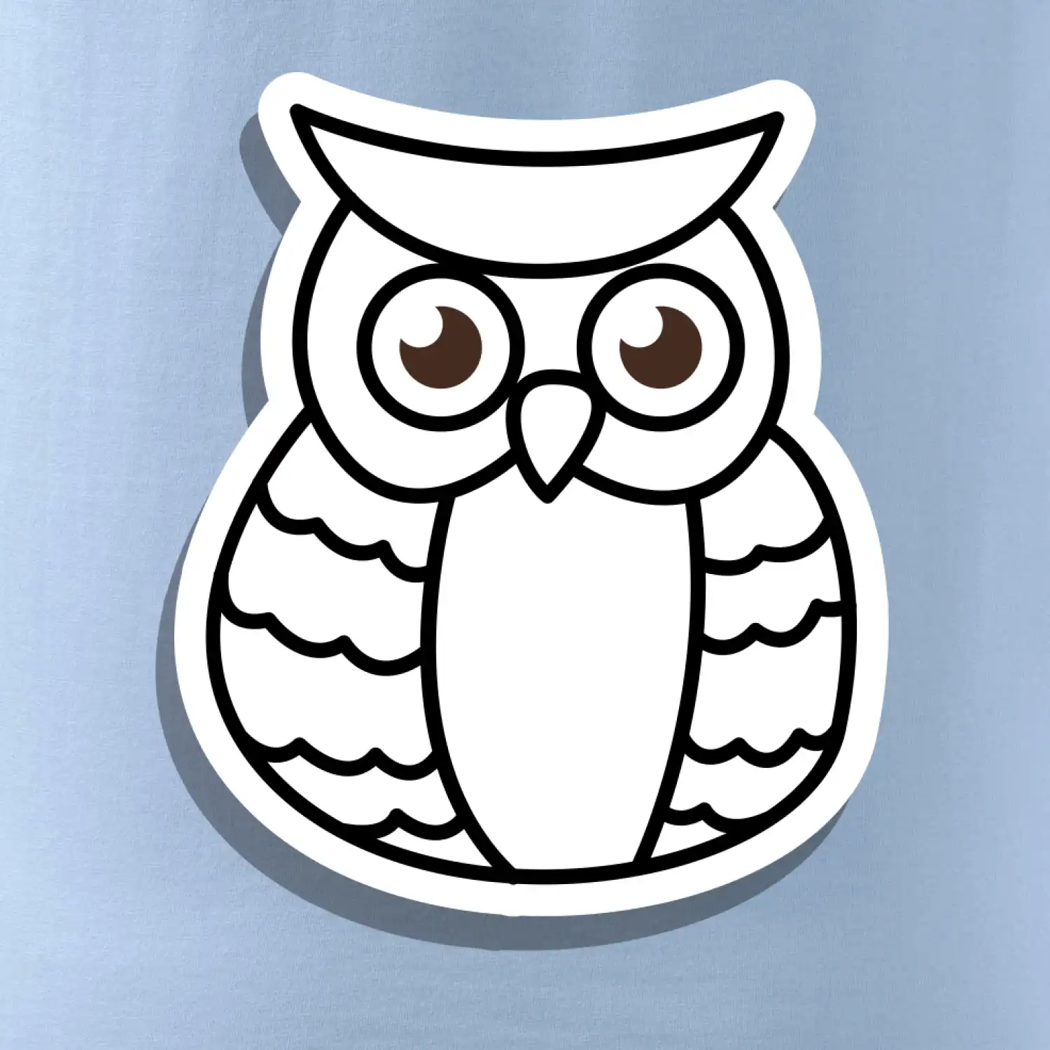 Sova kreslená na prsu