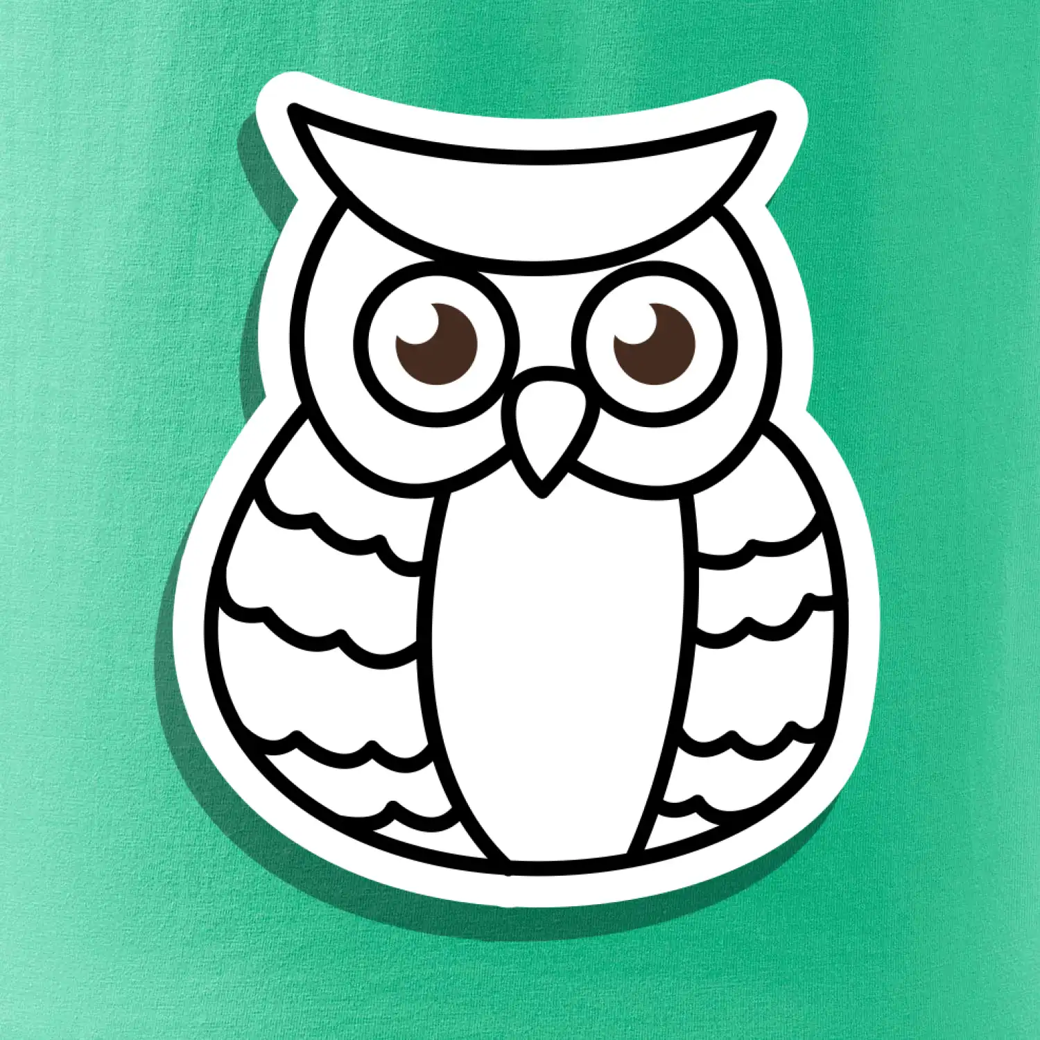 Sova kreslená na prsu