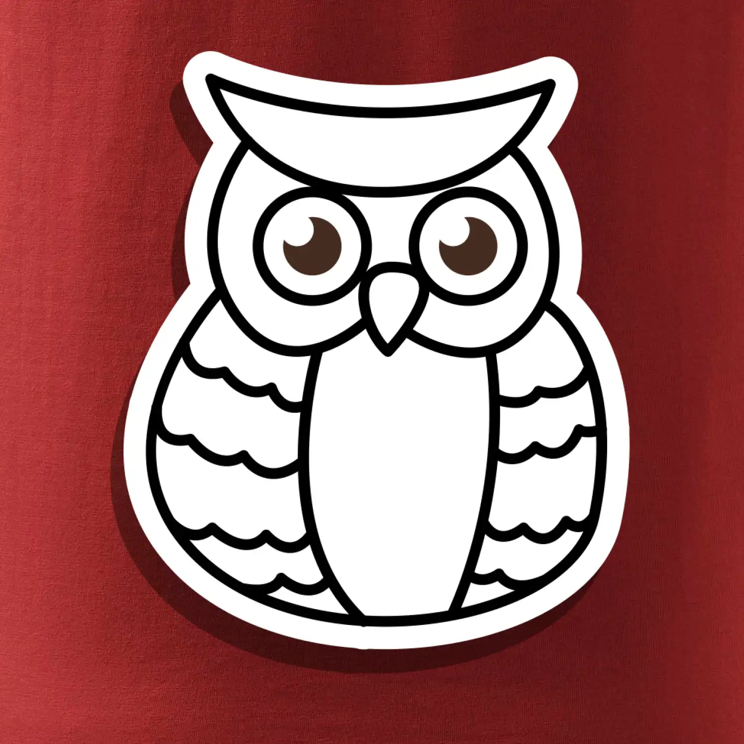 Sova kreslená na prsu